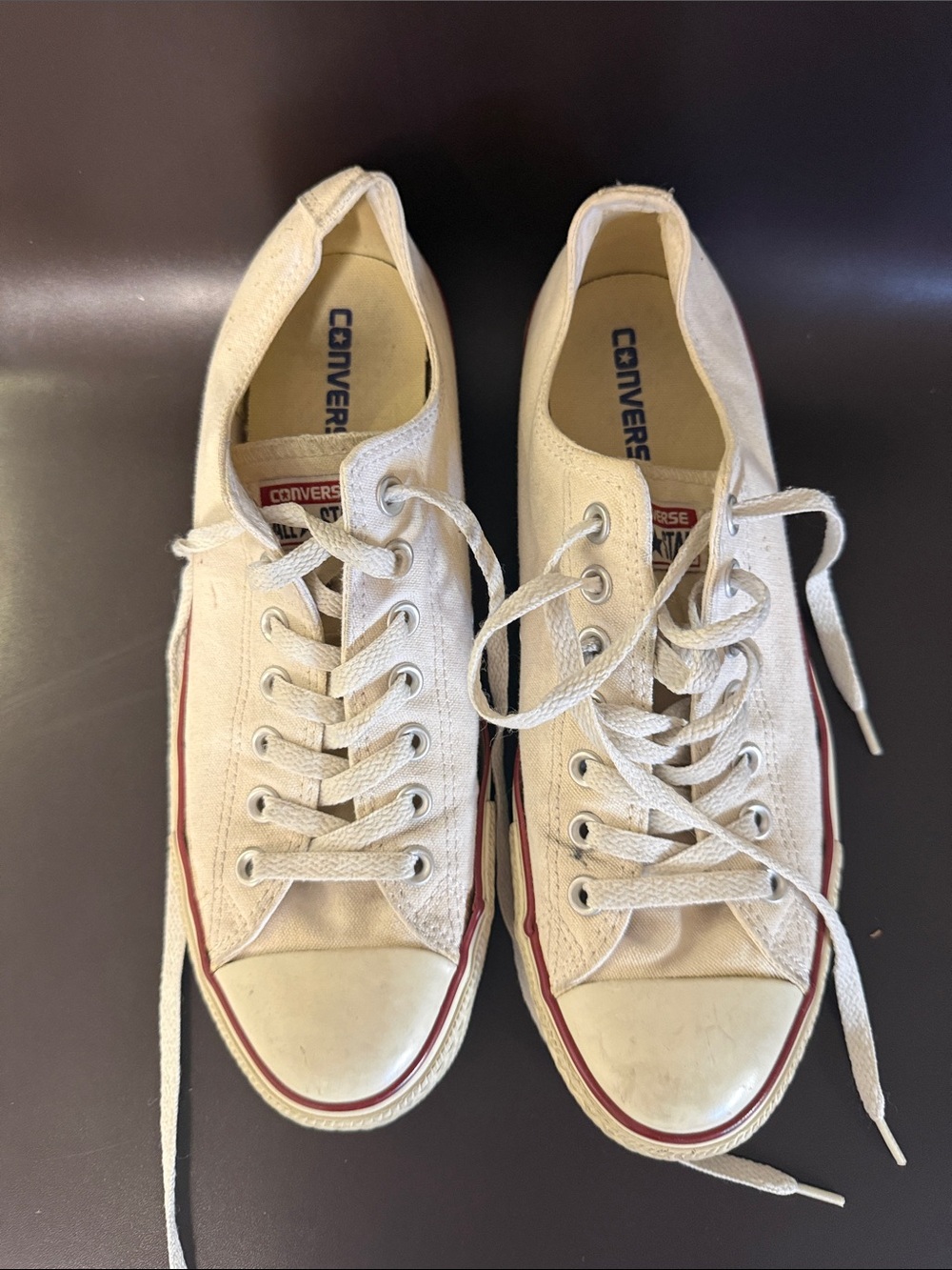 Converse Low Top Sneakers in White with Red Trim